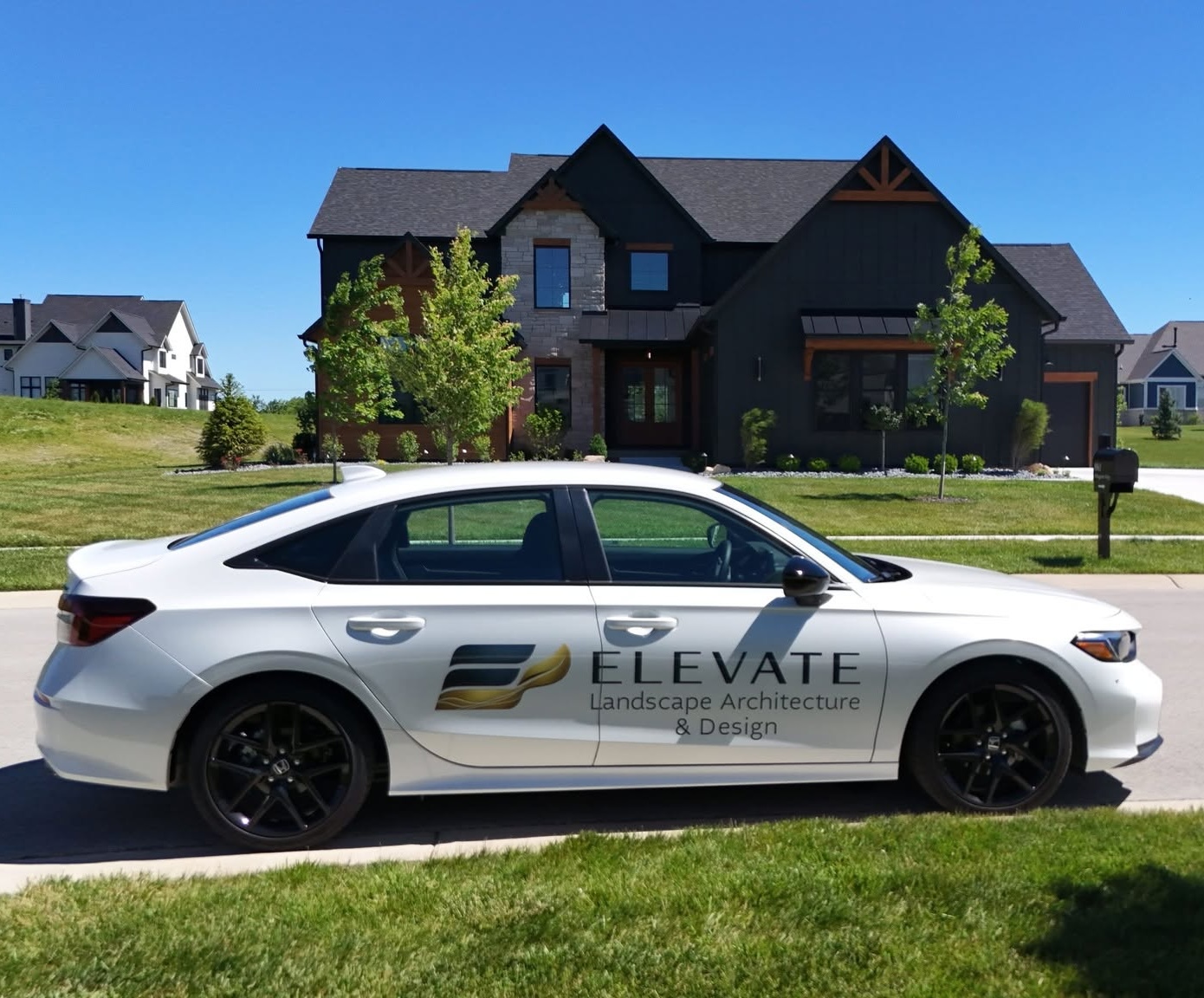 Elevate Landscape Architecture vehicle at a completed residential project